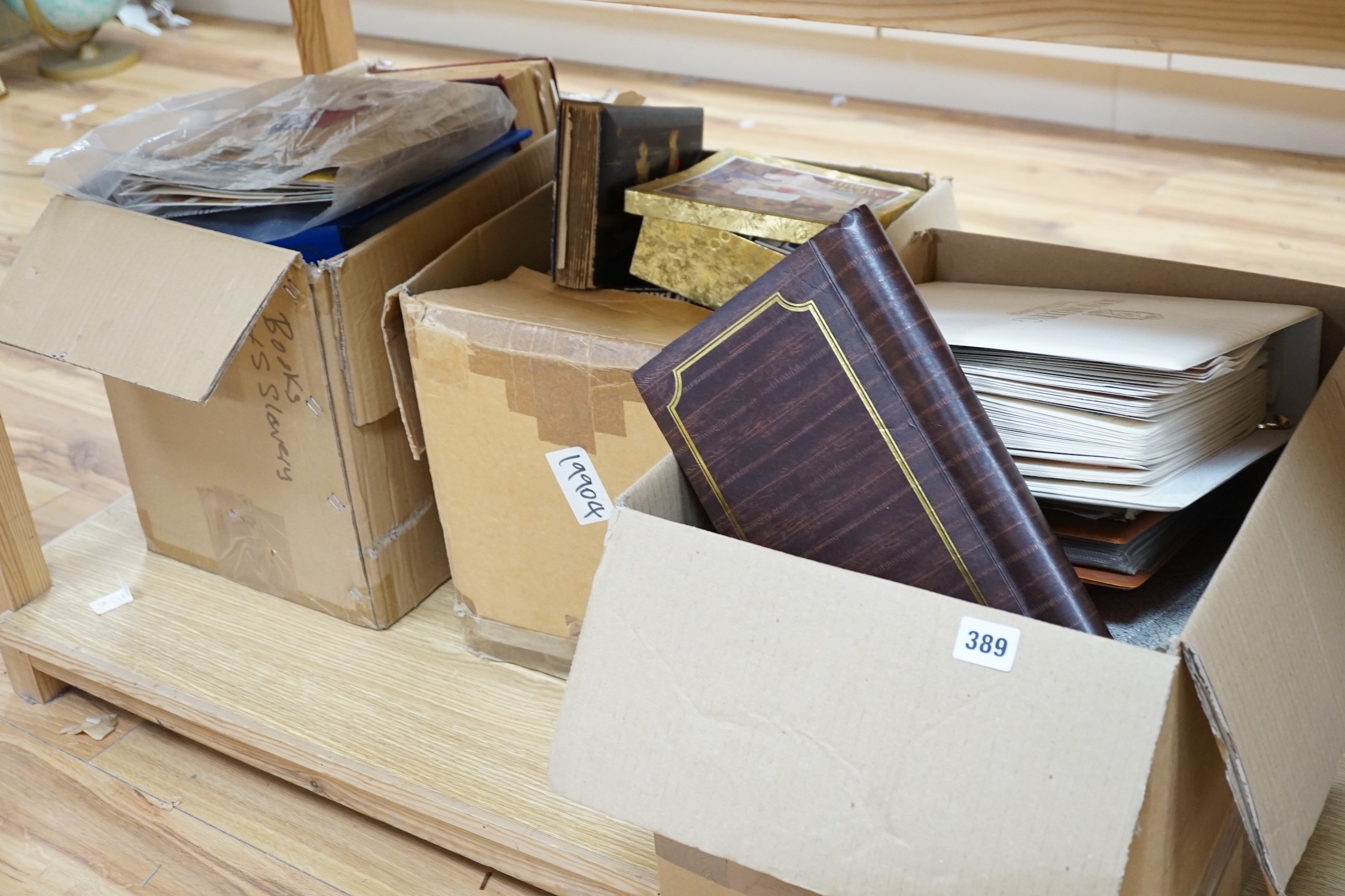 A large quantity of assorted world stamps, first day covers, cigarette cards and ephemera.